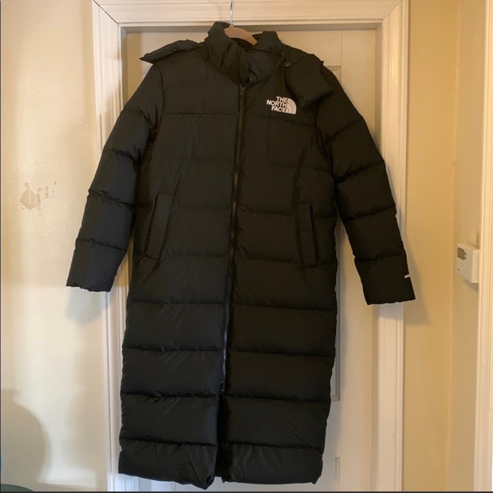 North face women’s long coat with removable hood.